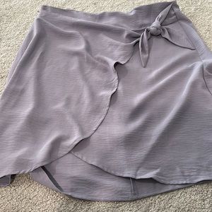 Purple knee length skirt